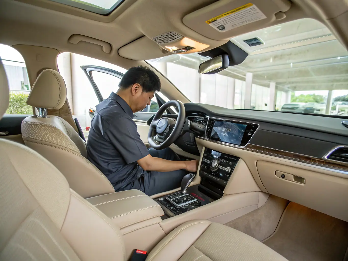 A vehicle appraiser carefully inspecting a car's interior, emphasizing the thoroughness of vehicle valuation services, with a focus on detail and accuracy.